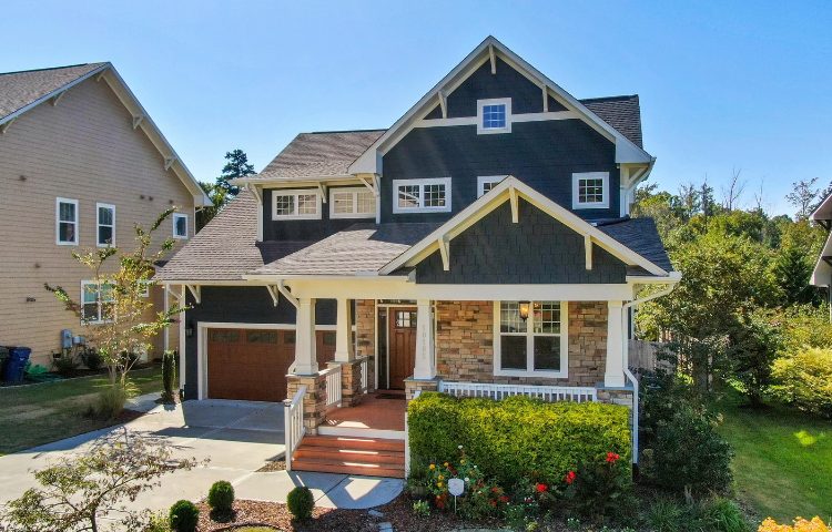 Blue house with brick accent